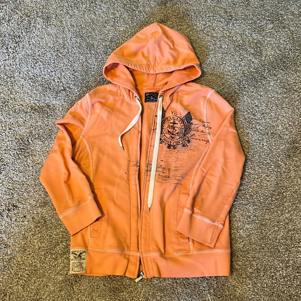 A coral nautical zip up sweatshirt